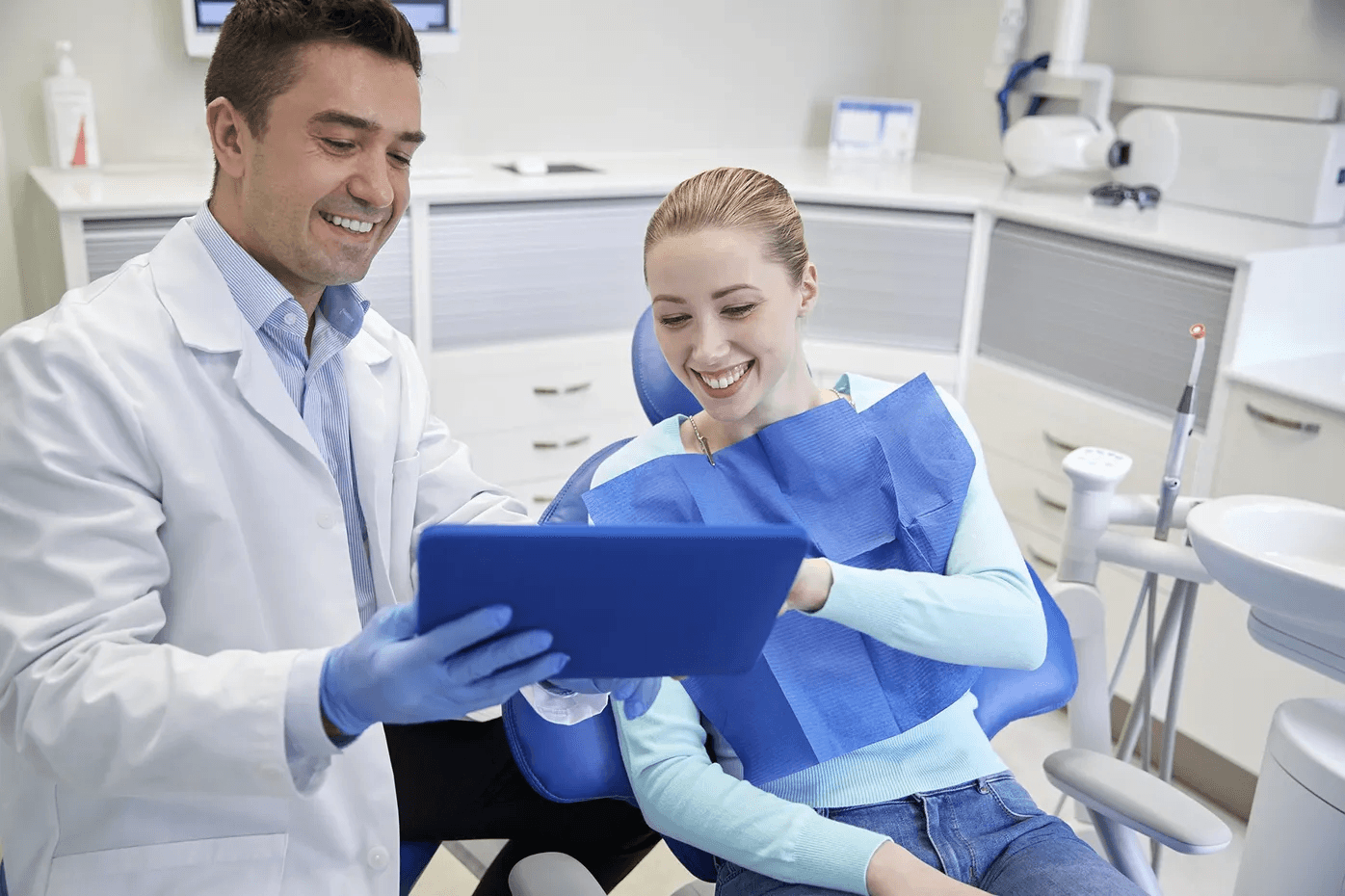 Dentist reviewing a treatment plan with a smiling patient